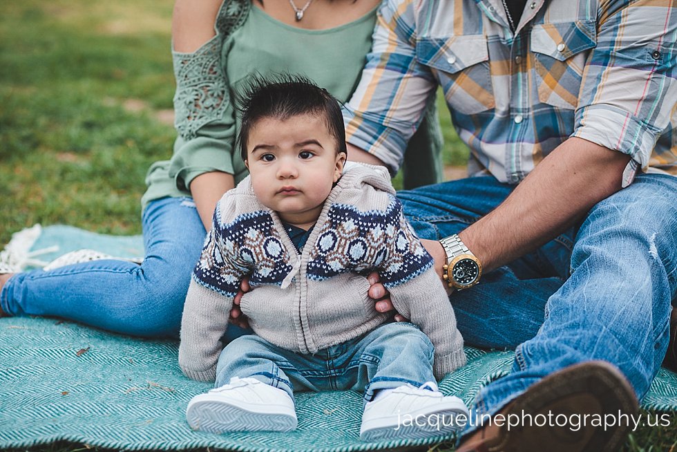 Baby boy looking at the camera session in Irving Tx
